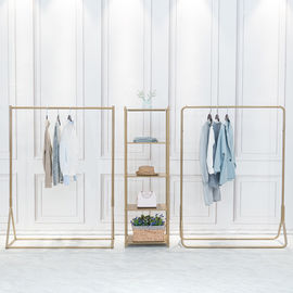Китай Положение нордического дизайна золотое одевает шкаф, стеллаж для выставки товаров одежды магазина земной поставщик